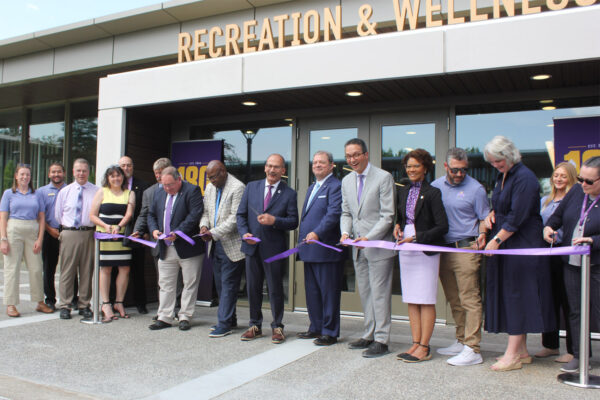 Team cutting the ribbon at UAlbany Colonial Quad