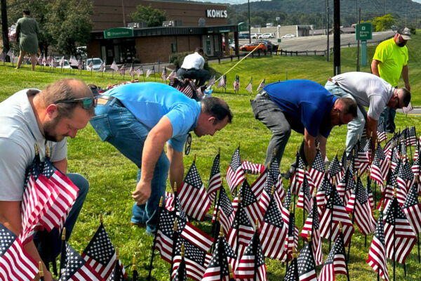 Binghamton team placing flags for United Way 9/11 Tribute