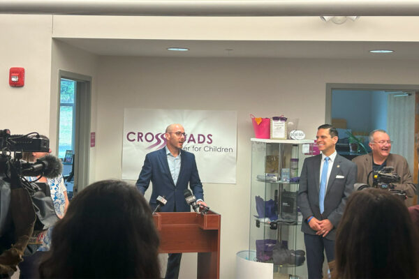 Dave Hollander speaking at Crossroads Ribbon Cutting